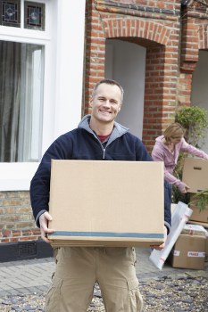 Furniture collection team preparing for pick-up in a Belgravia street