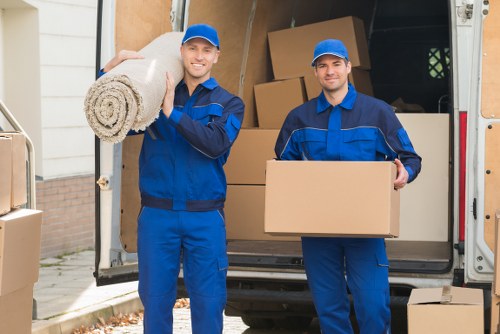 Belgravia moving team loading boxes into a van