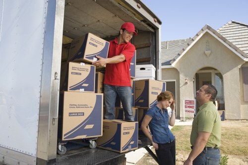 Team moving household items from a Belgravia apartment or townhouse