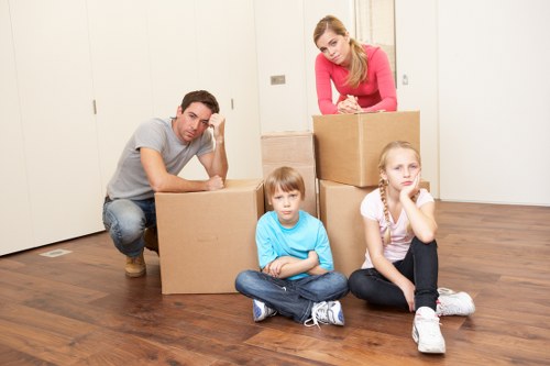 Careful moving of household items in a Belgravia apartment building