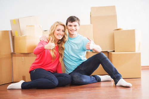 Belgravia local moving service transporting boxes carefully