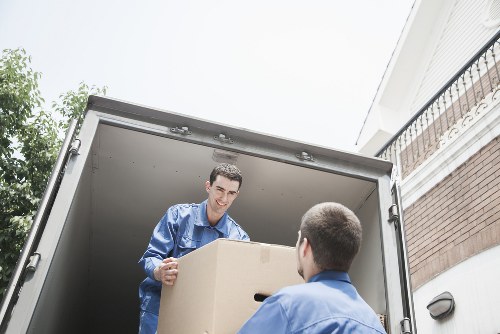 Packed boxes and furniture ready for a local Belgravia removals service